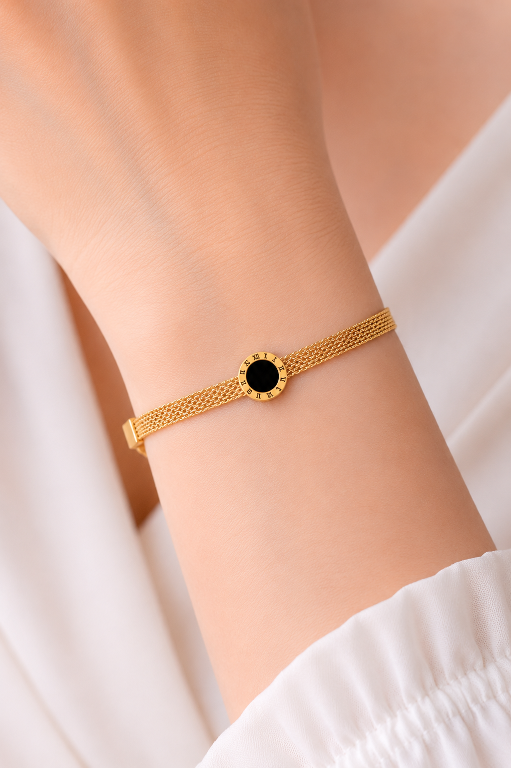 Elegant Gold Mesh Bracelet with Black Roman Dial Charm